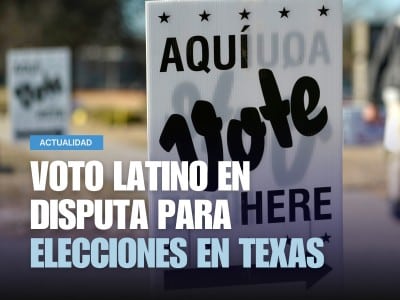 Un letrero que señala hacia un centro de votación